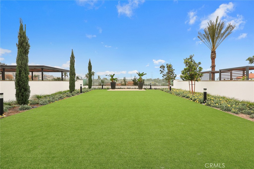 478 Sycamore Montebello, CA 90640 - Photo 56 of 67 a view of a garden with a building in the background