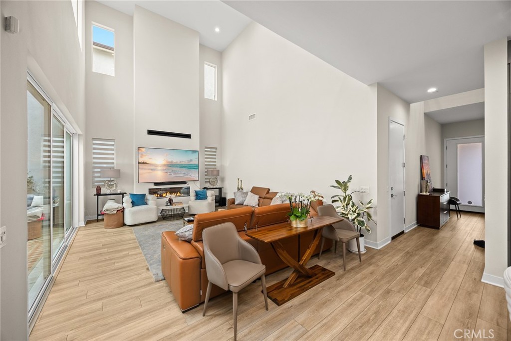 478 Sycamore Montebello, CA 90640 - Photo 7 of 67 a living room with furniture and wooden floor