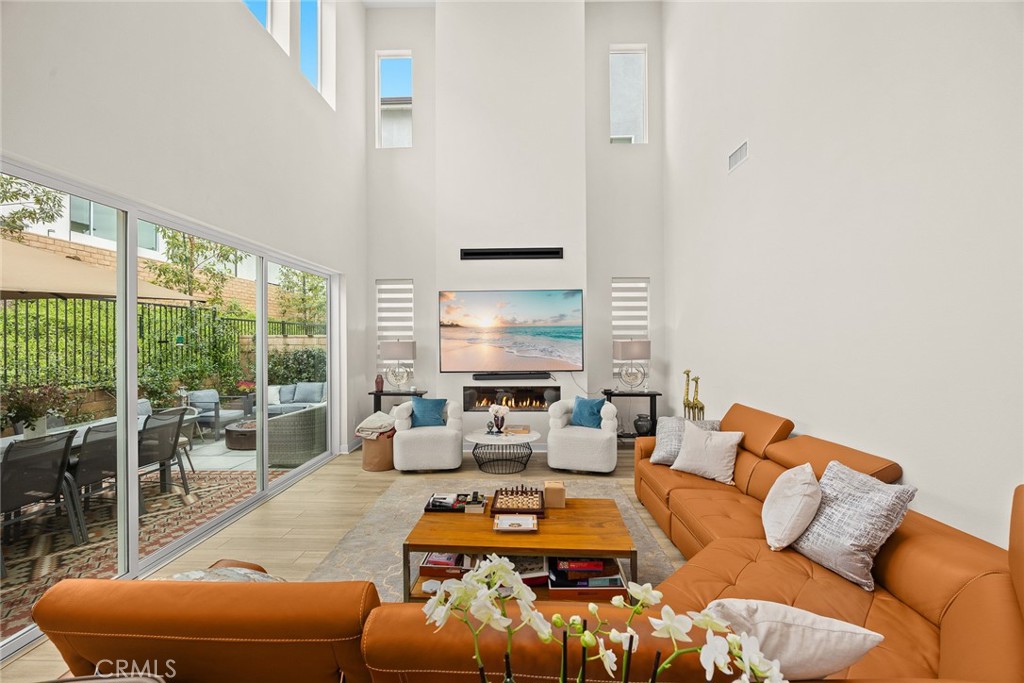 478 Sycamore Montebello, CA 90640 - Photo 9 of 67 a living room with furniture a large window and a view of bedroom