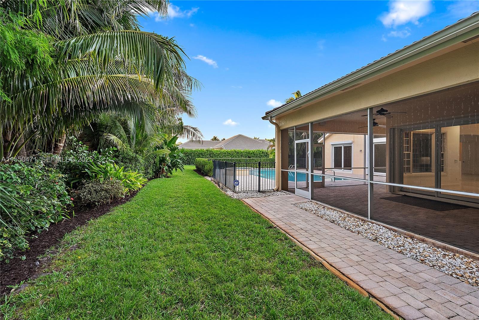 133 Mystic Lane Jupiter, FL 33458 - Photo 13 of 56 Rear Patio / Pool