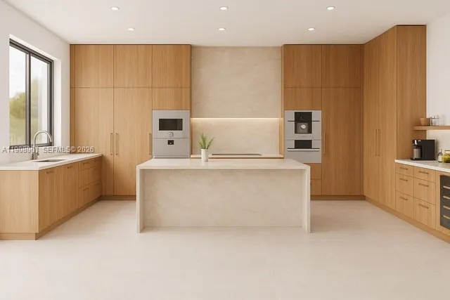a view of kitchen with stainless steel appliances cabinets