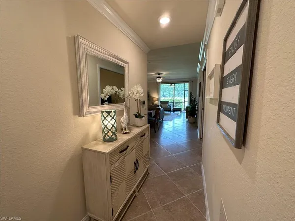 a view of living room with furniture and a flat screen tv