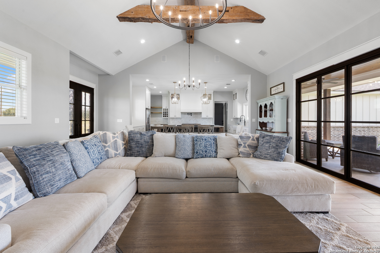 32139 Giboney Road Hempstead, TX 77445 - Photo 19 of 65 a living room with furniture and a chandelier