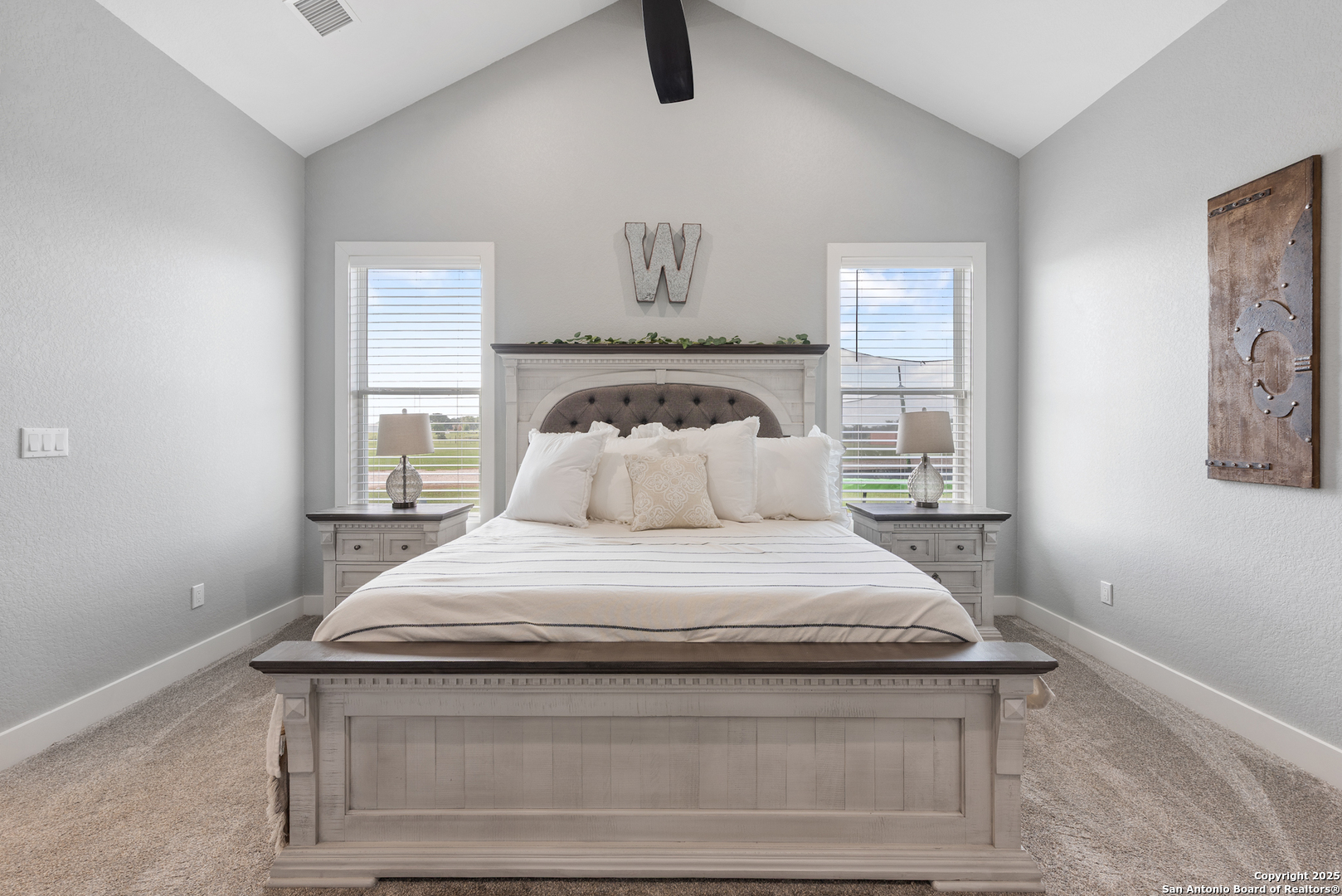 32139 Giboney Road Hempstead, TX 77445 - Photo 23 of 65 a bedroom with a bed and painting on the wall