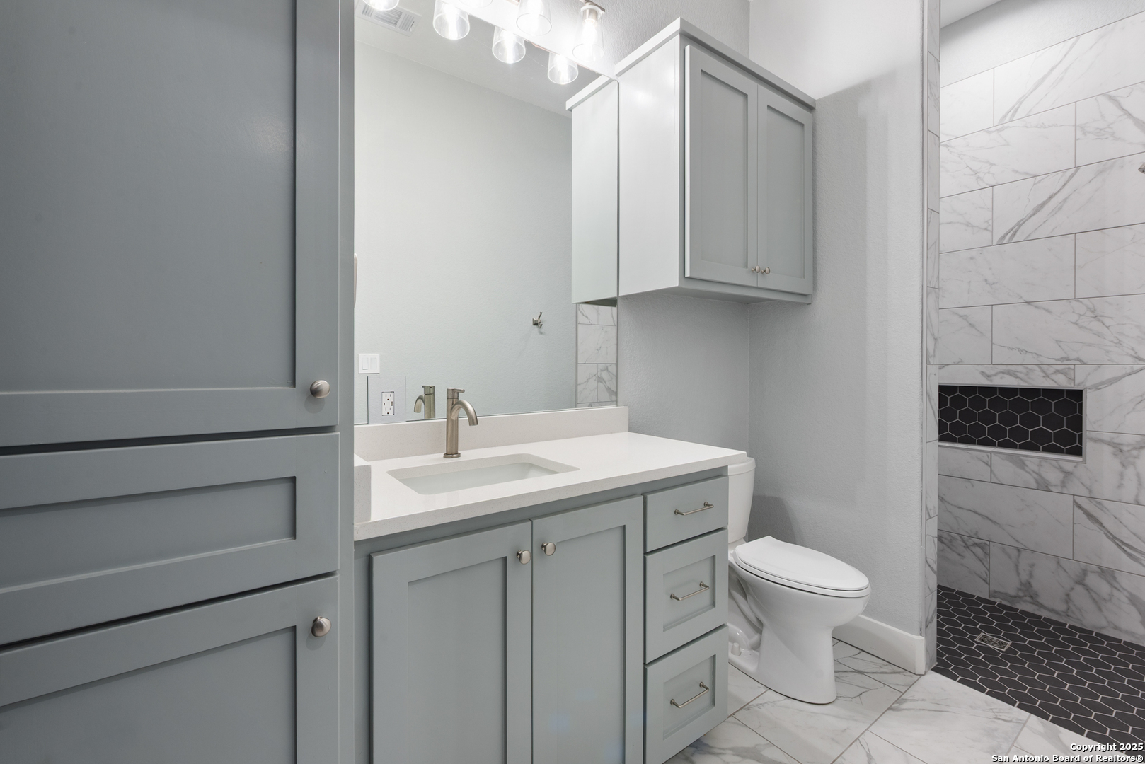 32139 Giboney Road Hempstead, TX 77445 - Photo 43 of 65 a bathroom with a toilet sink and mirror