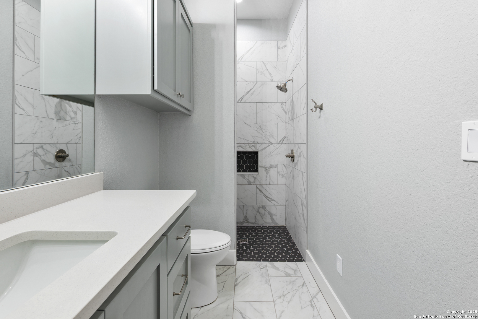 32139 Giboney Road Hempstead, TX 77445 - Photo 45 of 65 a bathroom with a sink a toilet and shower
