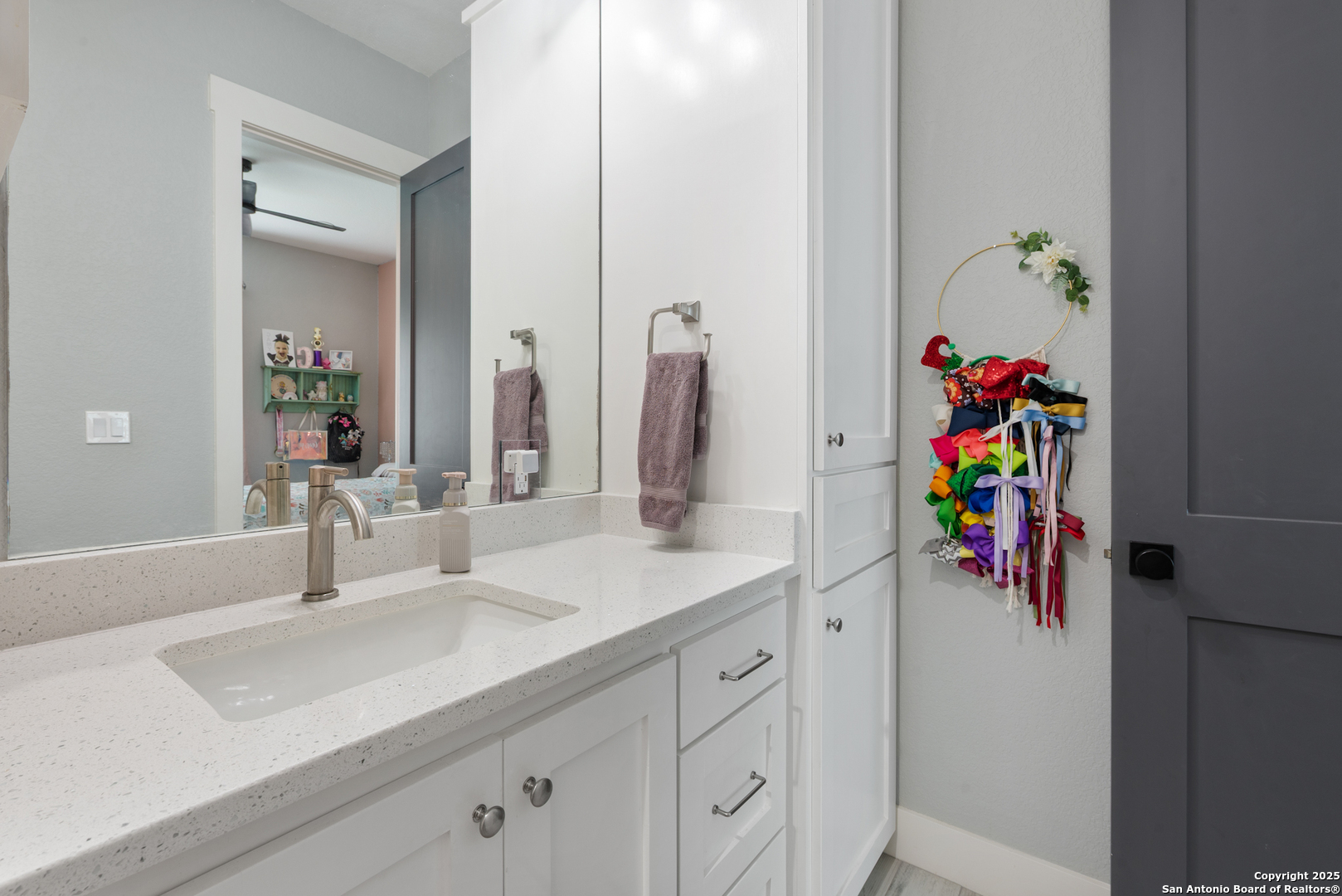 32139 Giboney Road Hempstead, TX 77445 - Photo 49 of 65 a bathroom with a sink mirror and vanity