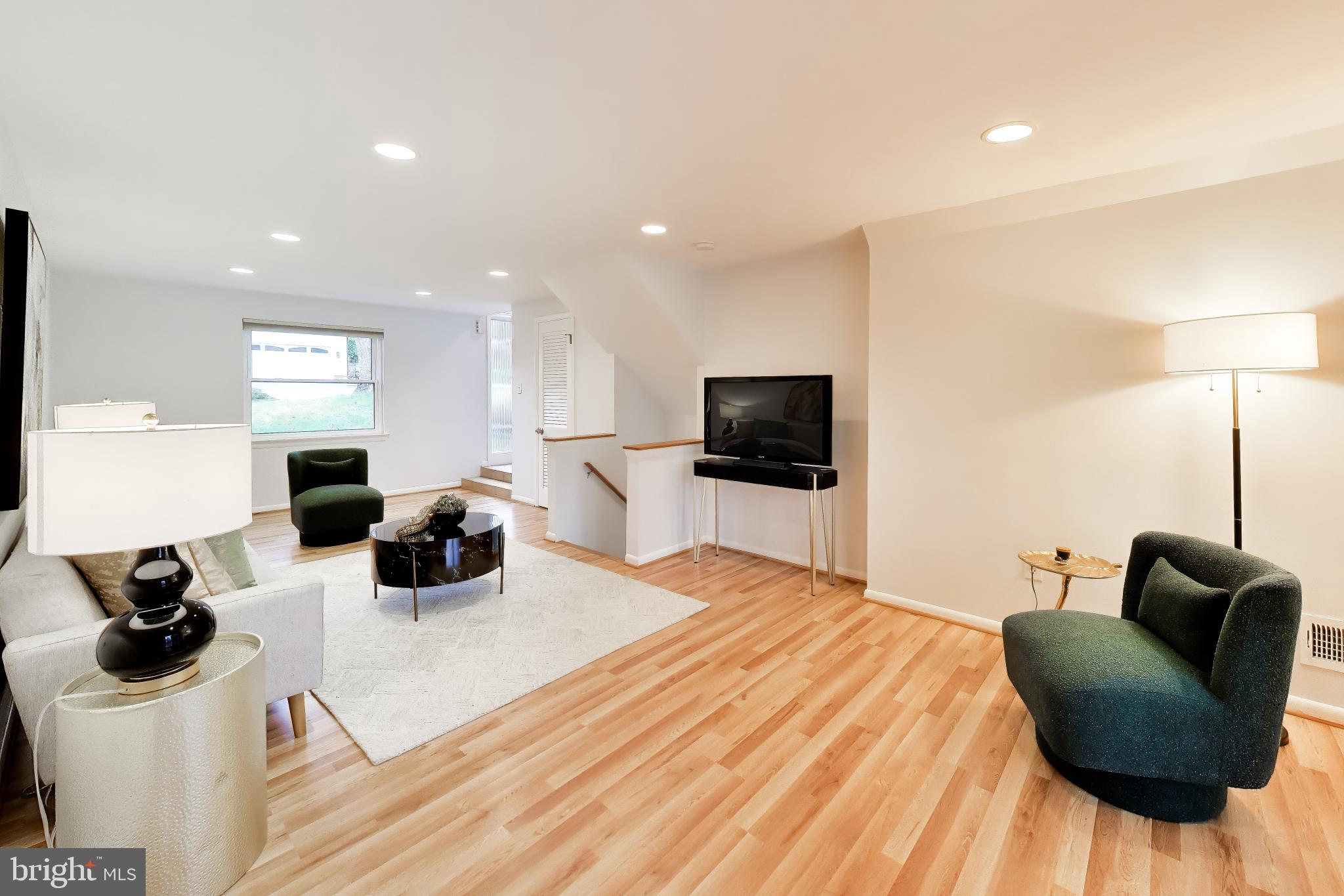 6514 Wilmett Road Bethesda, MD 20817 - Photo 11 of 38 2nd Family Room with walk-out to rear balcony