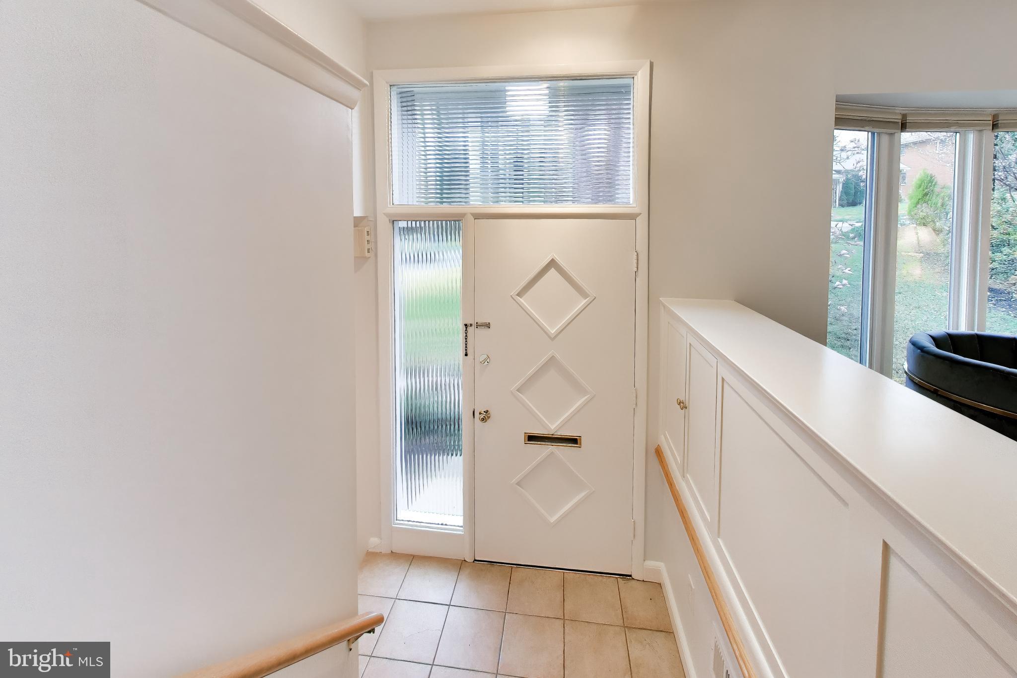 6514 Wilmett Road Bethesda, MD 20817 - Photo 2 of 38 Ceramic Tile Entry Way with Lots of Light