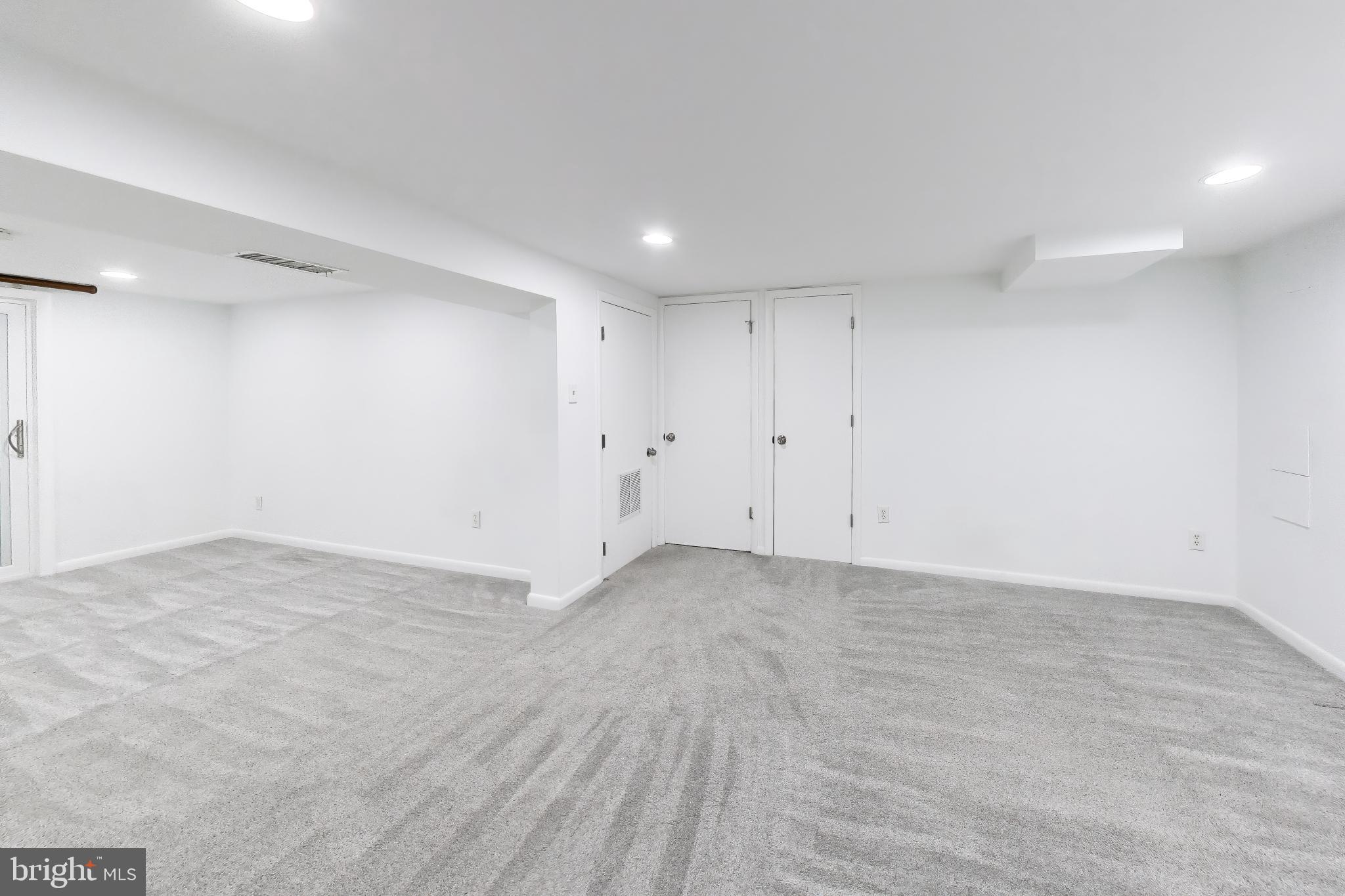 6514 Wilmett Road Bethesda, MD 20817 - Photo 25 of 38 Only carpet in the house on basement walk-out leve