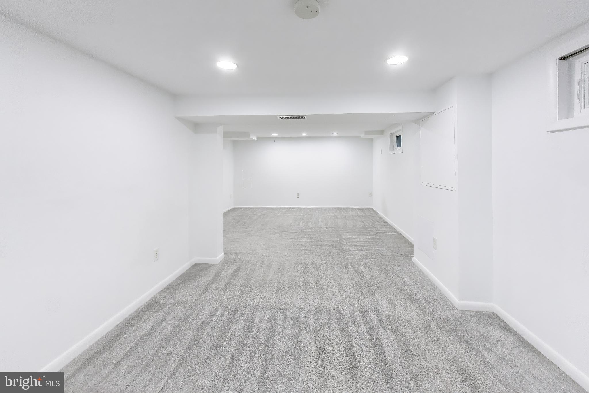 6514 Wilmett Road Bethesda, MD 20817 - Photo 26 of 38 Recessed lighting brightens the space