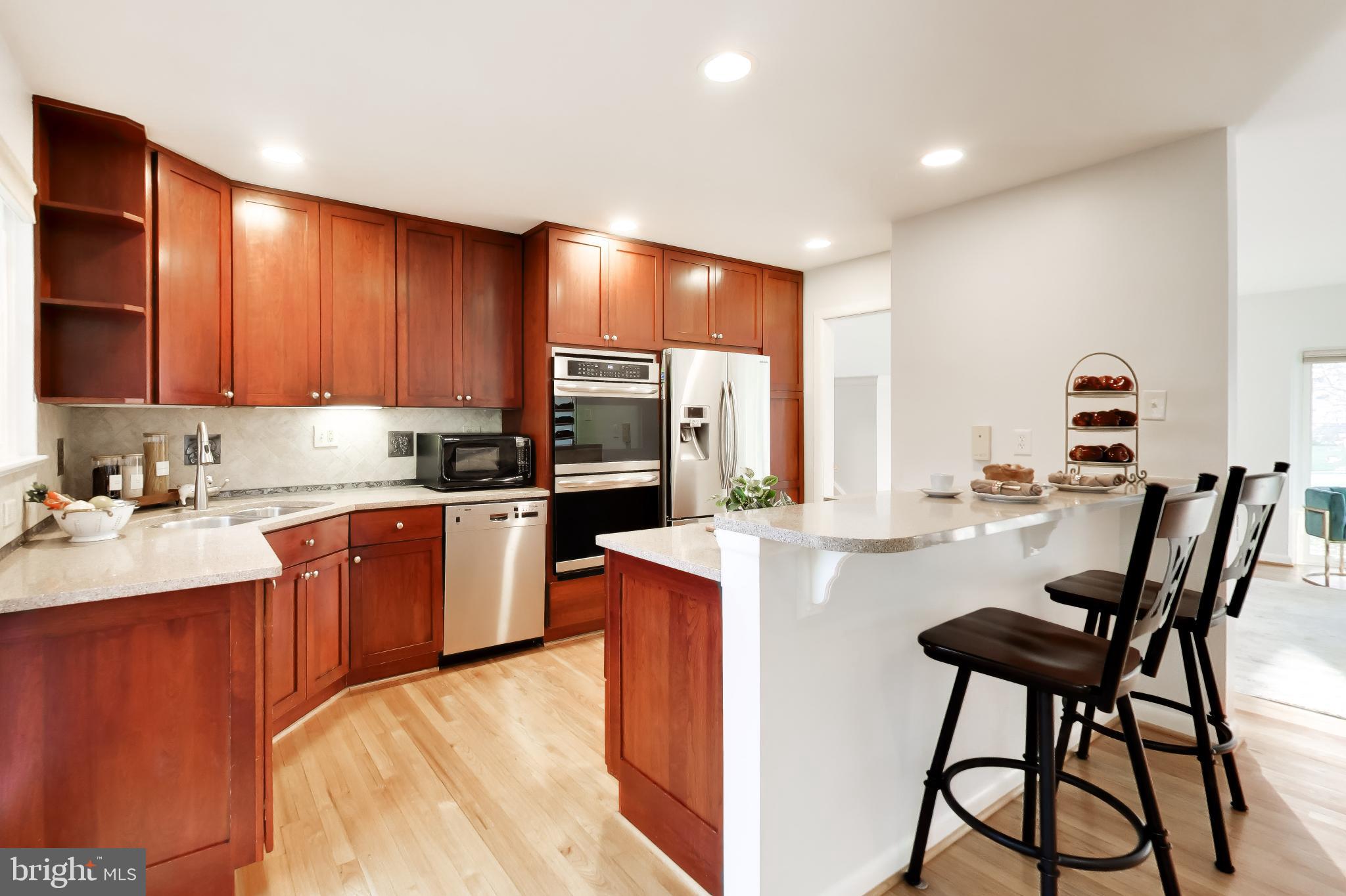 6514 Wilmett Road Bethesda, MD 20817 - Photo 8 of 38 Updated kitchen open to dining & living area