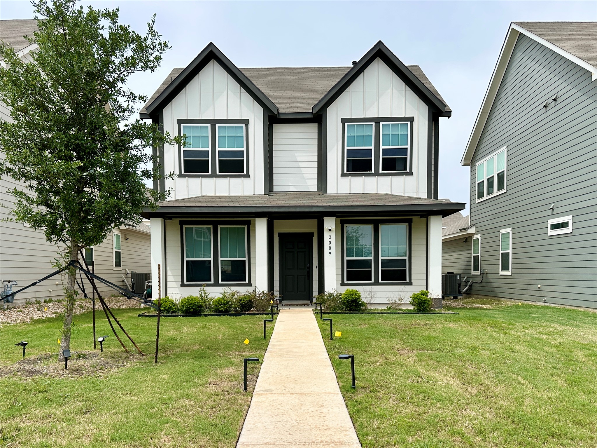 2009 Winston Way Leander, TX 78641 - Photo 21 of 21 a house view with a garden and large trees