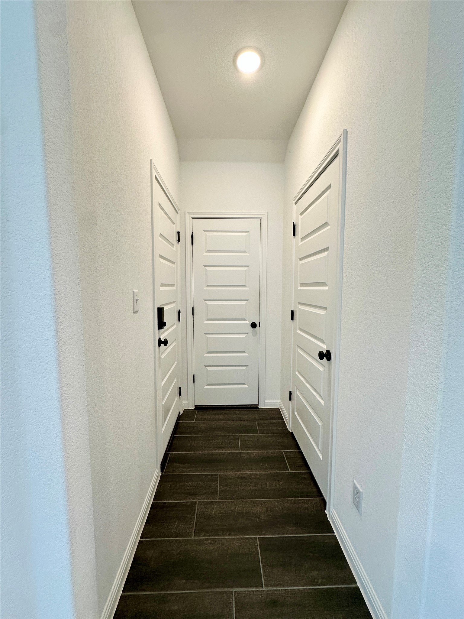 2009 Winston Way Leander, TX 78641 - Photo 8 of 21 a view of a hallway with wooden floor and entryway
