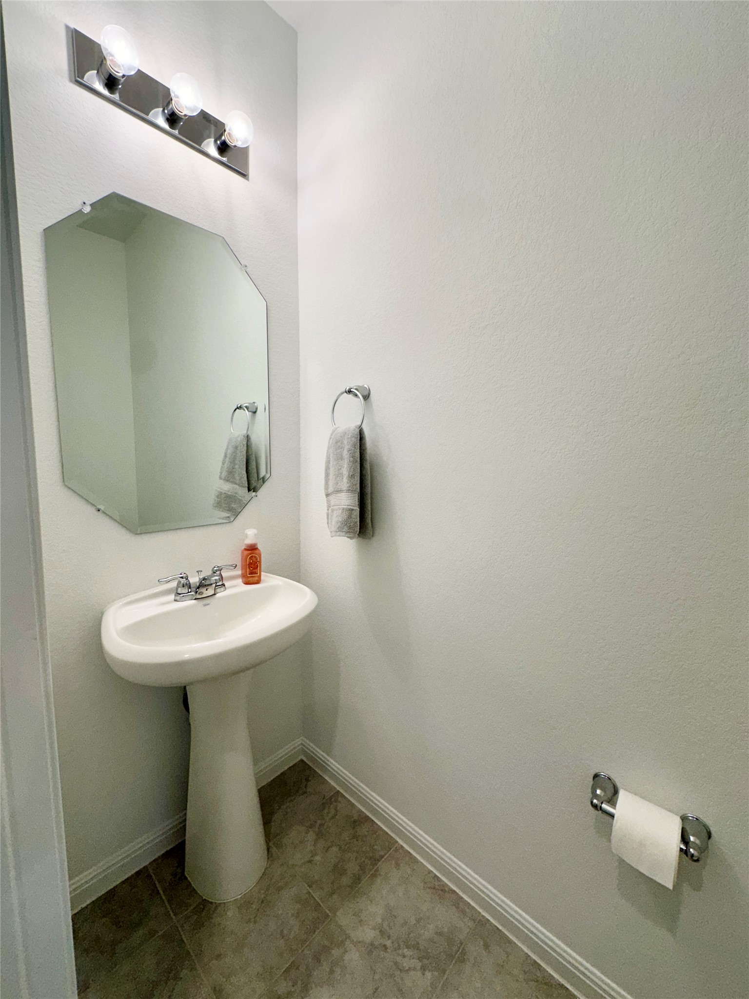 2009 Winston Way Leander, TX 78641 - Photo 9 of 21 a bathroom with a sink and mirror