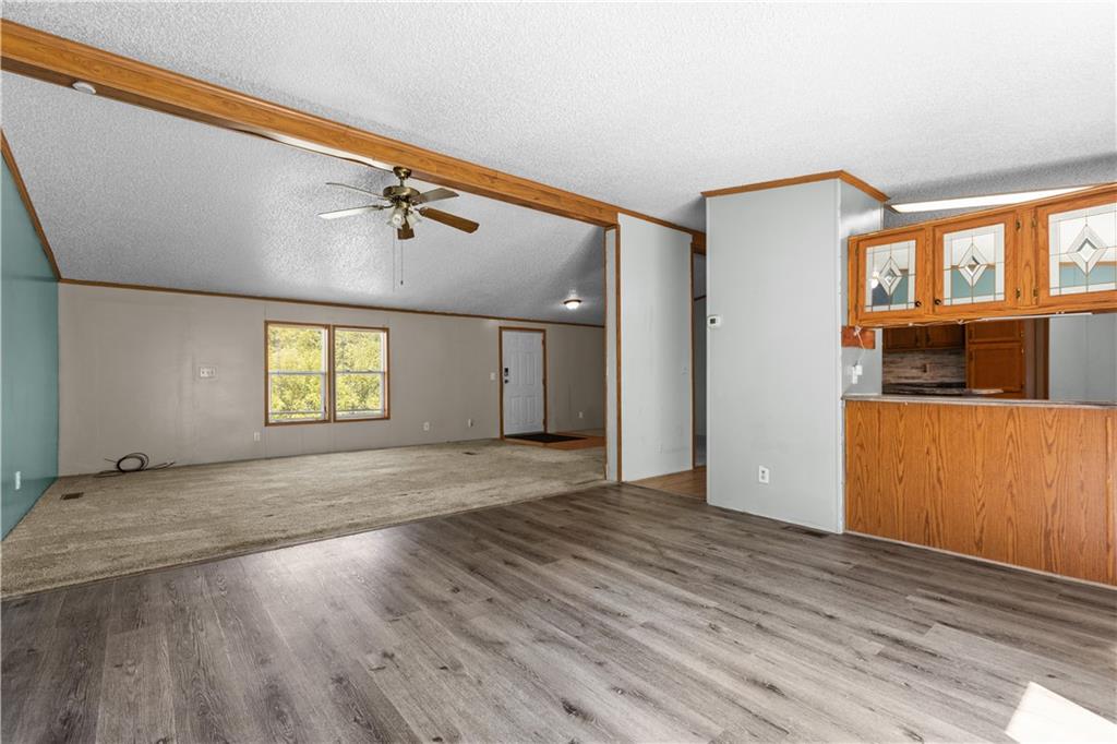610 Pleasant Valley Road Washington, PA 15301 - Photo 13 of 27 a view of an empty room with wooden floor and a window