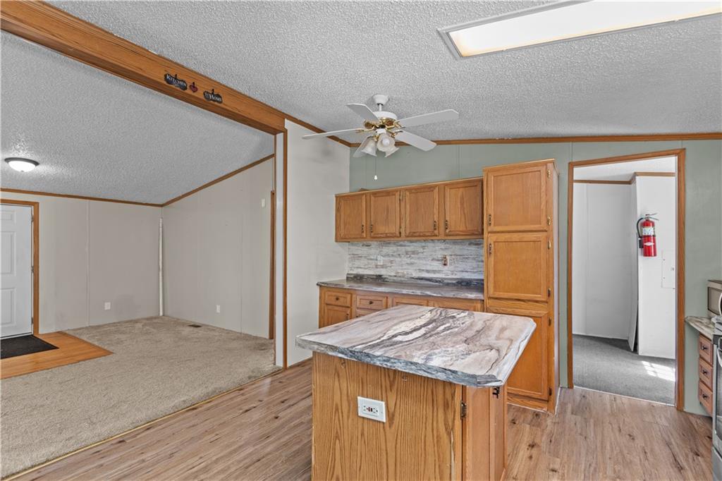 610 Pleasant Valley Road Washington, PA 15301 - Photo 18 of 27 a kitchen with a stove and a refrigerator