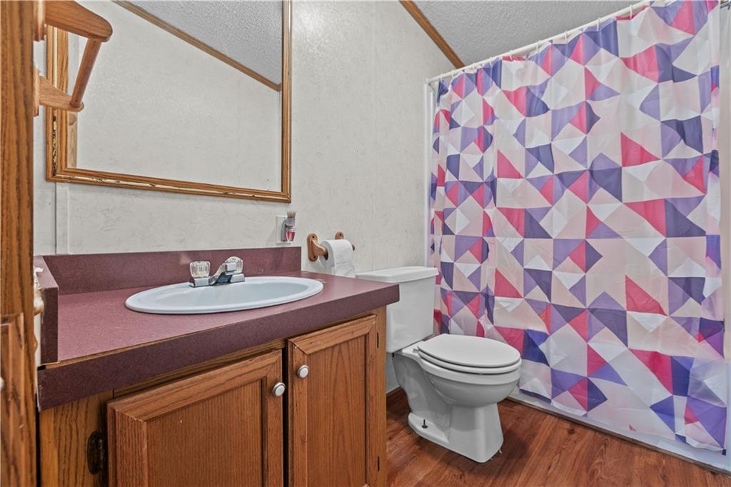 610 Pleasant Valley Road Washington, PA 15301 - Photo 20 of 27 a bathroom with a sink and a mirror