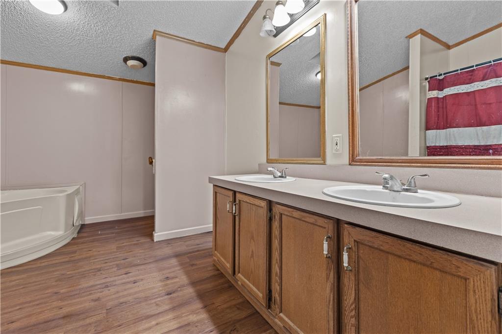610 Pleasant Valley Road Washington, PA 15301 - Photo 27 of 27 a bathroom with a sink and a mirror