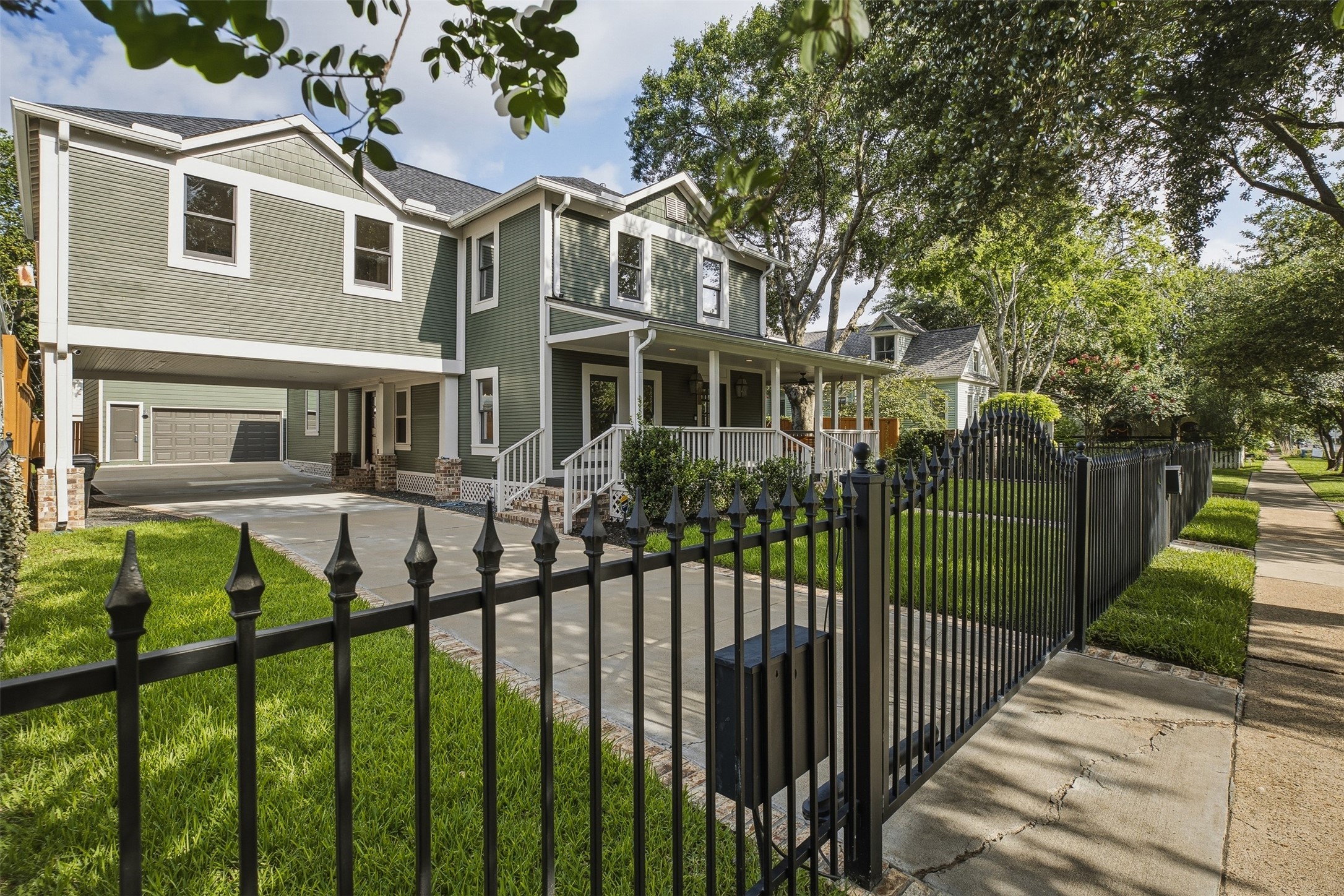 1535 Rutland Street Houston, TX 77008 - Photo 1 of 50 a view of a house with iron fence