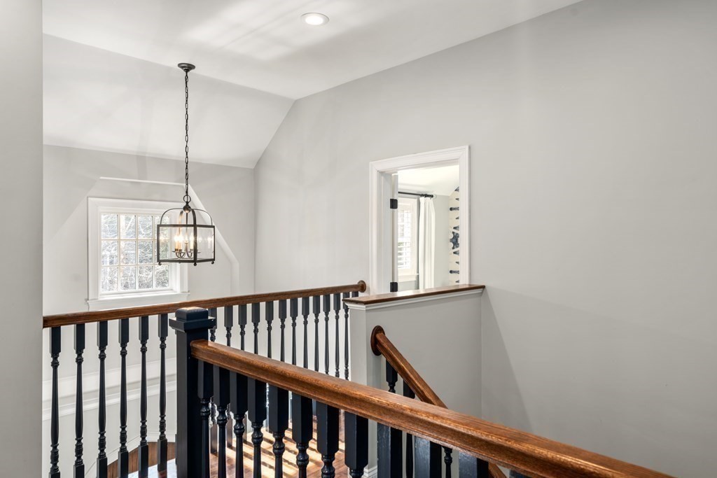 15 Old Town Road Wellesley, MA 02481 - Photo 17 of 30 a view of a hallway with windows