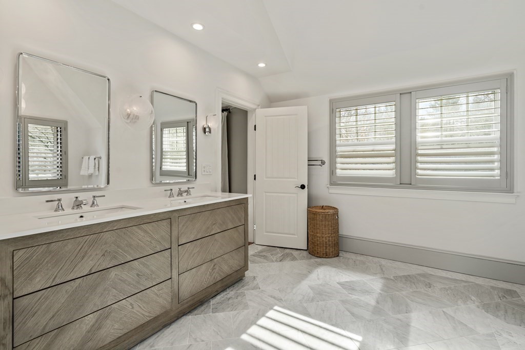 15 Old Town Road Wellesley, MA 02481 - Photo 22 of 30 a bathroom with double vanity and a mirror
