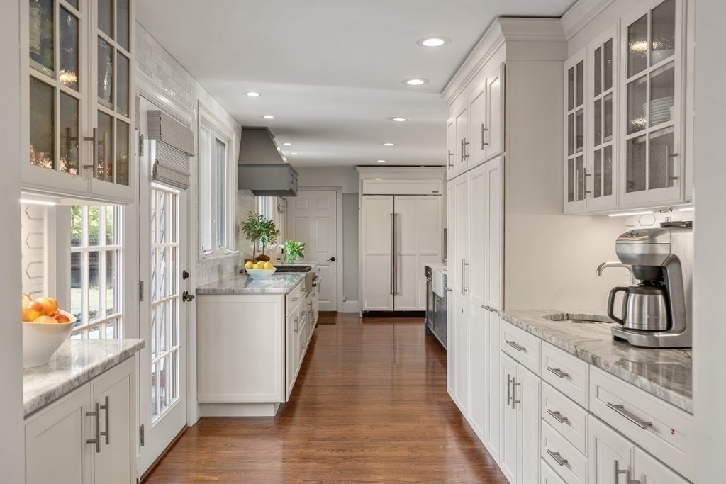 15 Old Town Road Wellesley, MA 02481 - Photo 7 of 30 a kitchen with a refrigerator and a sink