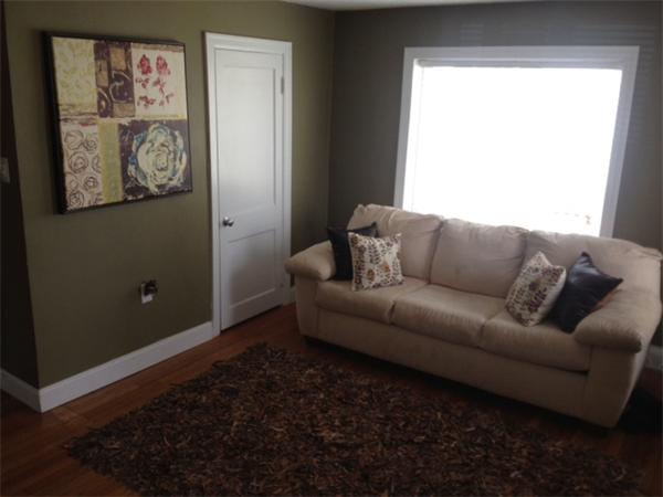 254 Shawmut Street Springfield, MA 01108 - Photo 2 of 21 a living room with furniture and a window