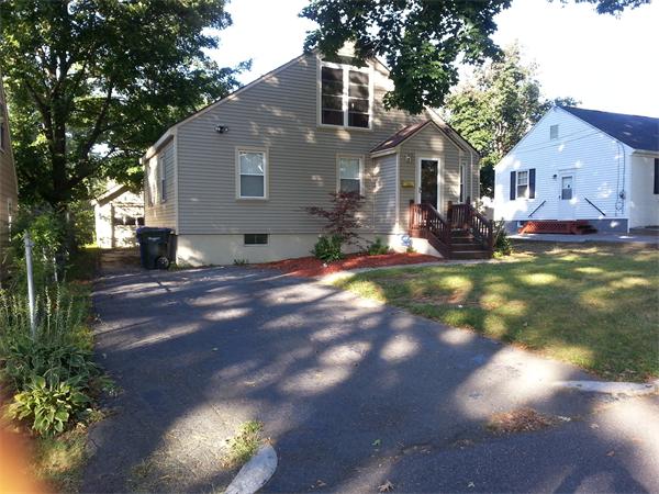 254 Shawmut Street Springfield, MA 01108 - Photo 21 of 21 a view of a house with a yard