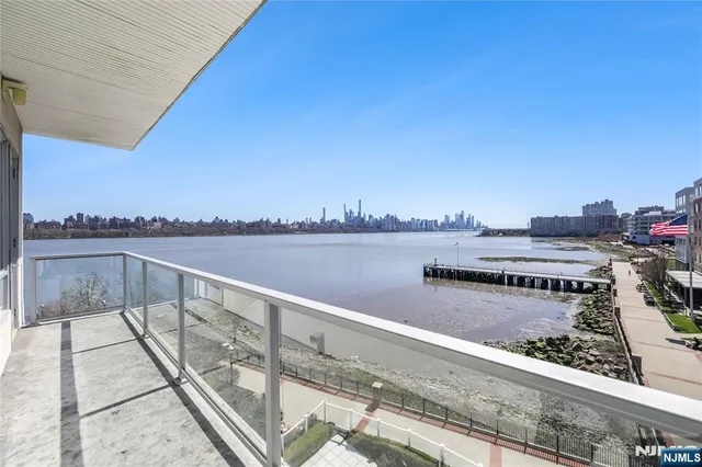 a view of a lake with a terrace