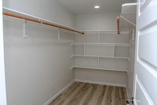 a view of an empty walk in closet