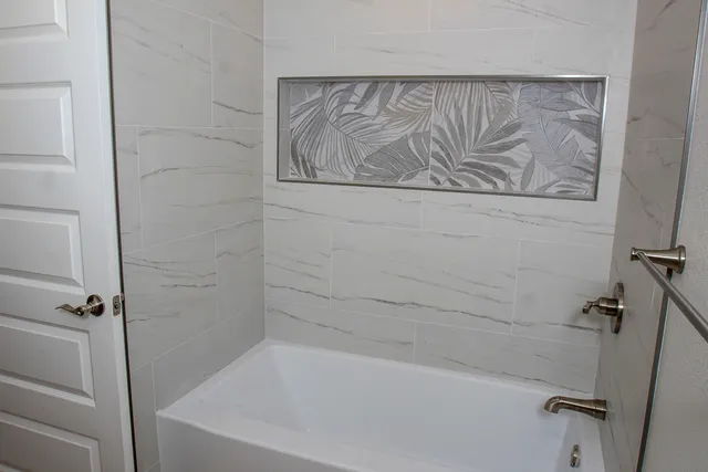 a bathroom with a bathtub