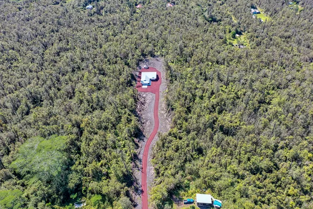 a close up of a wall with a building