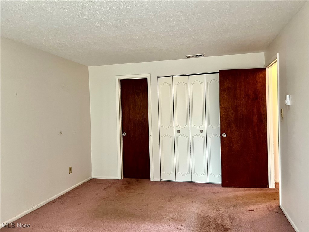 3068 Kent Road, Unit 105C Stow, OH 44224 - Photo 12 of 42 2 closets in primary bedroom