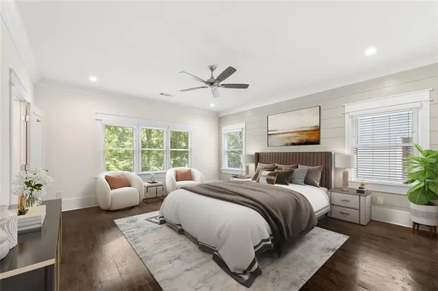 a bathroom with a sink vanity and mirror