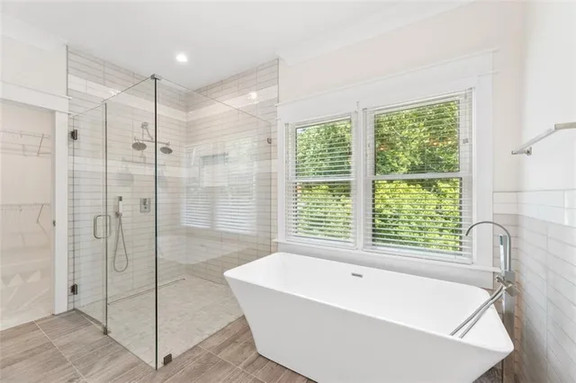 a view of a hallway with white walls