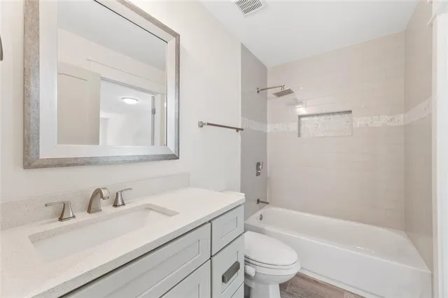 a view of balcony with wooden floor