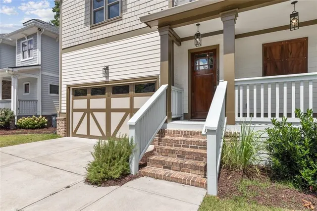 a front view of a house with a porch