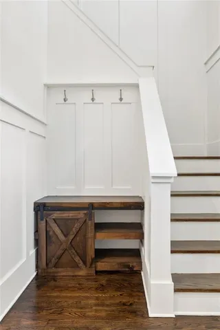 a view of entryway with wooden floor
