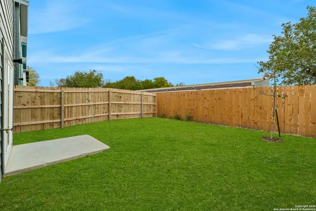 a view of a backyard with a garden