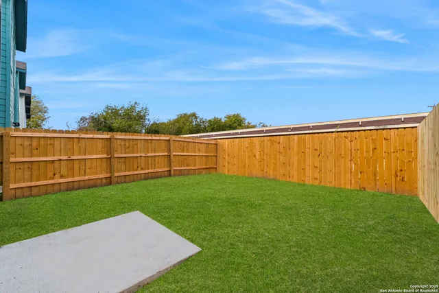 a group of some couches under an umbrella
