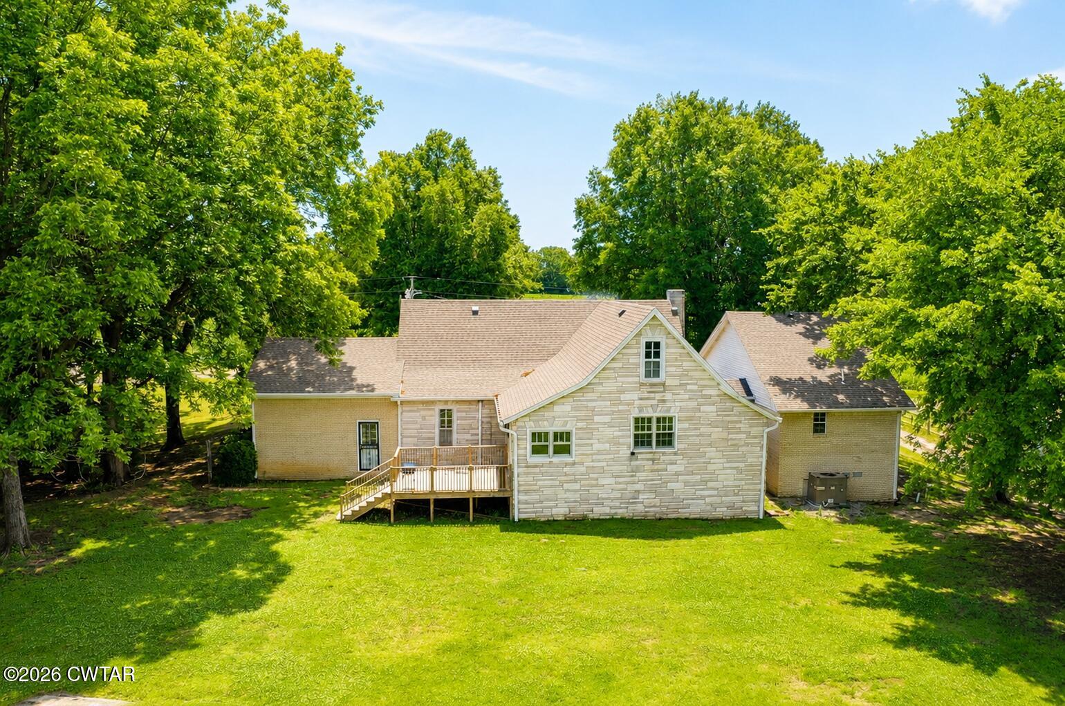 2800 Locust Grove Road Newbern, TN 38059 - Photo 45 of 46 a aerial view of a house with swimming pool garden and patio