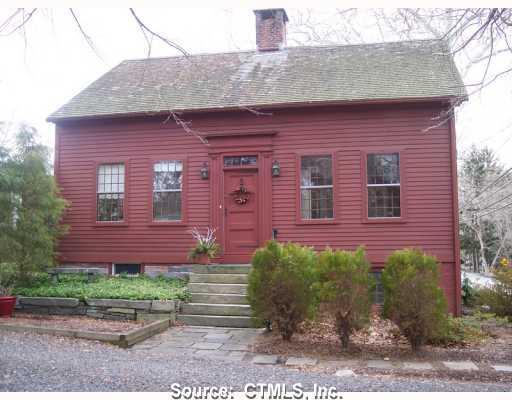 1185 Saybrook Road Haddam, CT 06438 - Photo 1 of 1 a front view of a house with a garden