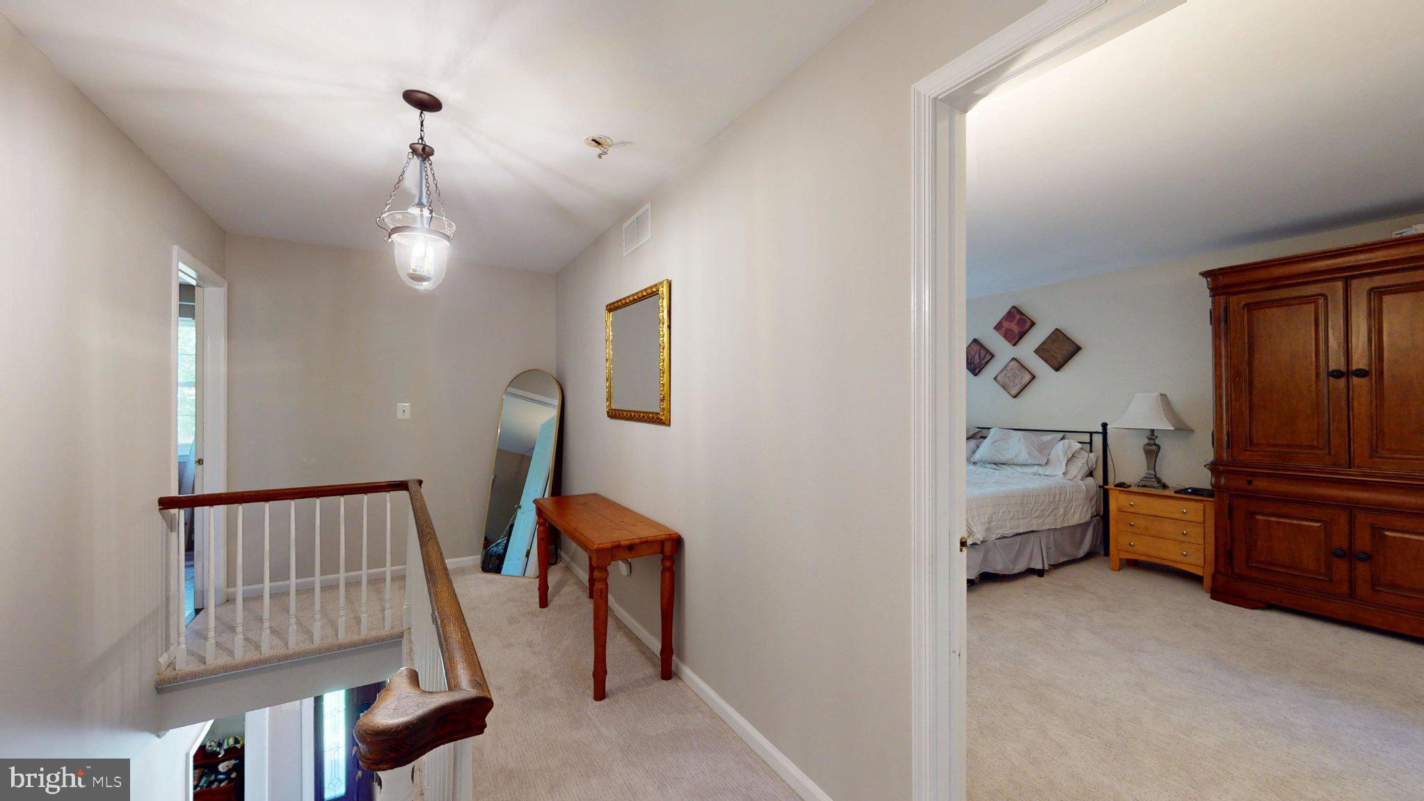 3 Colonial Court Medford, NJ 08055 - Photo 41 of 89 Inviting hallway with natural light.