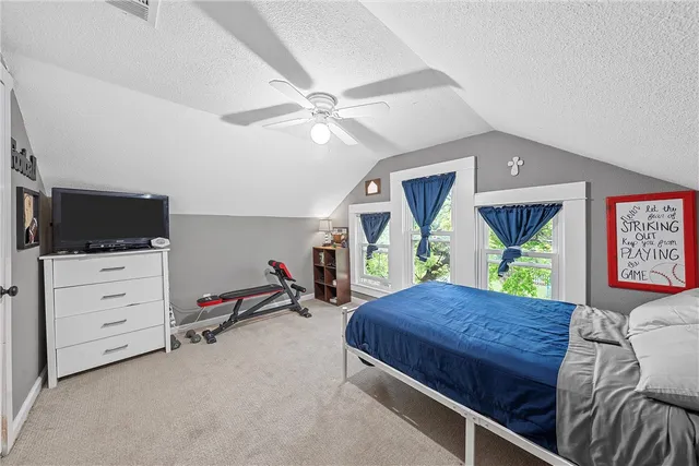 a bathroom with a granite countertop sink mirror and double