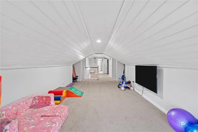 a view of a house with backyard and porch
