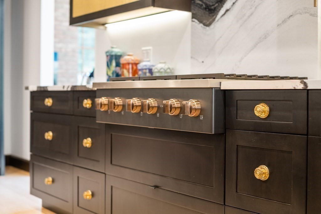 55 Scotch Pine Road Weston, MA 02493 - Photo 11 of 39 a close view of a sink and a stove