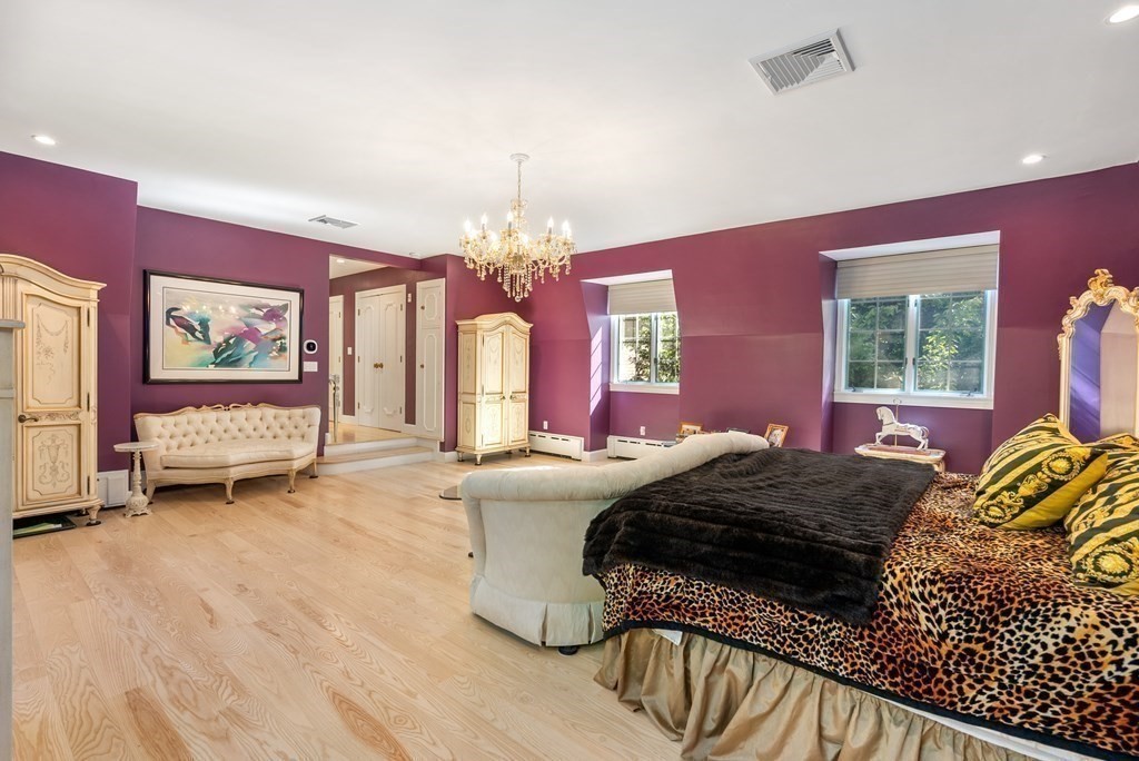 55 Scotch Pine Road Weston, MA 02493 - Photo 19 of 39 a bedroom with a bed dresser and a window