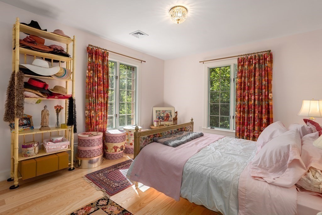 55 Scotch Pine Road Weston, MA 02493 - Photo 24 of 39 a bedroom with a bed and a window