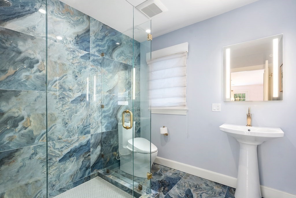 55 Scotch Pine Road Weston, MA 02493 - Photo 25 of 39 a bathroom with a sink toilet and shower